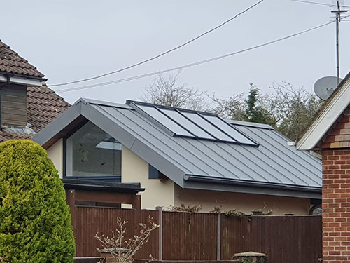 Gable roof with zinc